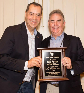 Bill Penney, President of Marine Bank receiving Chairman's Award