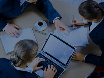 Business people working together at table