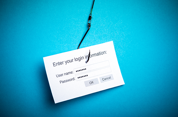 Conceptual image of a laptop illustration with the words 'That's A Scam' on the screen, below a headline that says: Did someone send you a check and ask you to send some money back?