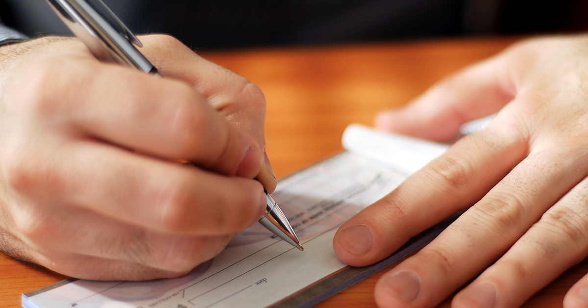 Man writing a check